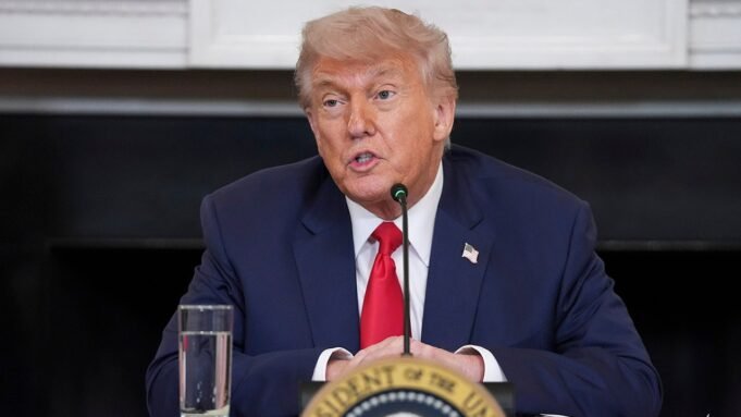 donald-trump-sitting.jpg