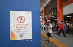 Cartazes de litterbugs exibidos em Chinatown enquanto a NEA se esforça para manter os bairros limpos