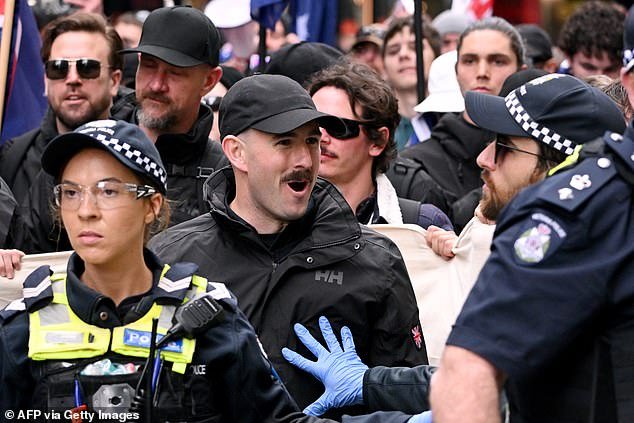 101718533-15091015-Sewell_appeared_at_the_March_for_Australia_protest_in_Melbourne_-a-1_1757655824080.jpg