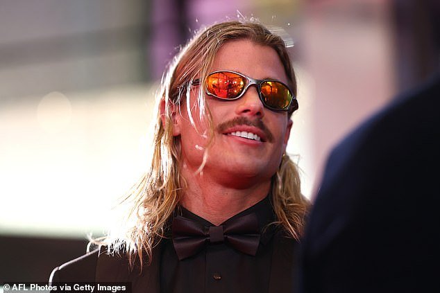 102340055-15121453-AFL_megastar_Bailey_Smith_pictured_has_finally_arrived_at_the_Br-a-1_1758530800008.jpg
