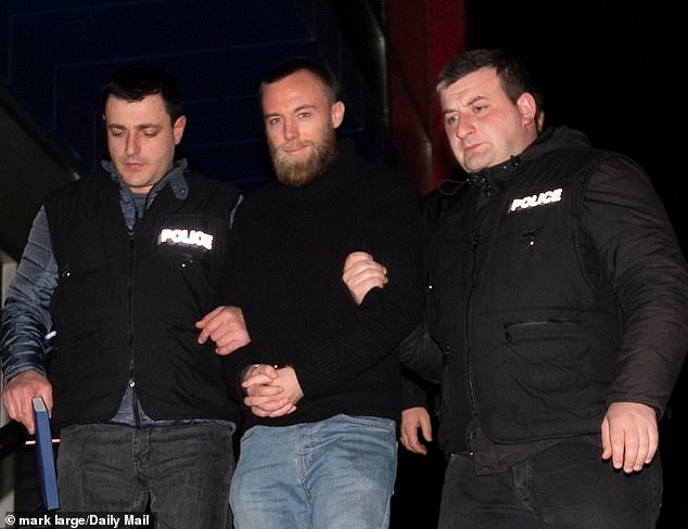80406715-15108927-Jack_Shepherd_led_away_in_handcuffs_by_Georgian_police_in_2019_h-m-2_1758145145623.jpg