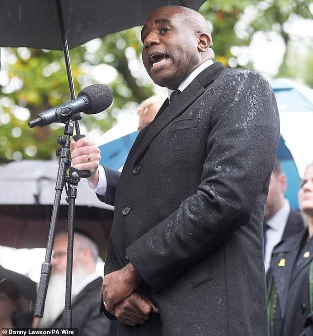 102681871-15160869-David_Lammy_was_booed_and_heckled_today_as_he_spoke_at_a_vigil_f-a-28_1759527287232.jpg