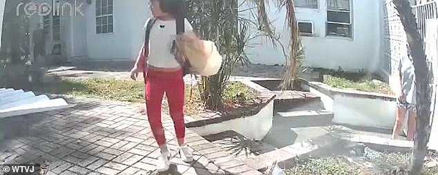 103329619-15228457-Surveillance_video_from_the_apartment_complex_shows_the_moment_a-m-1_1761510094274.jpg
