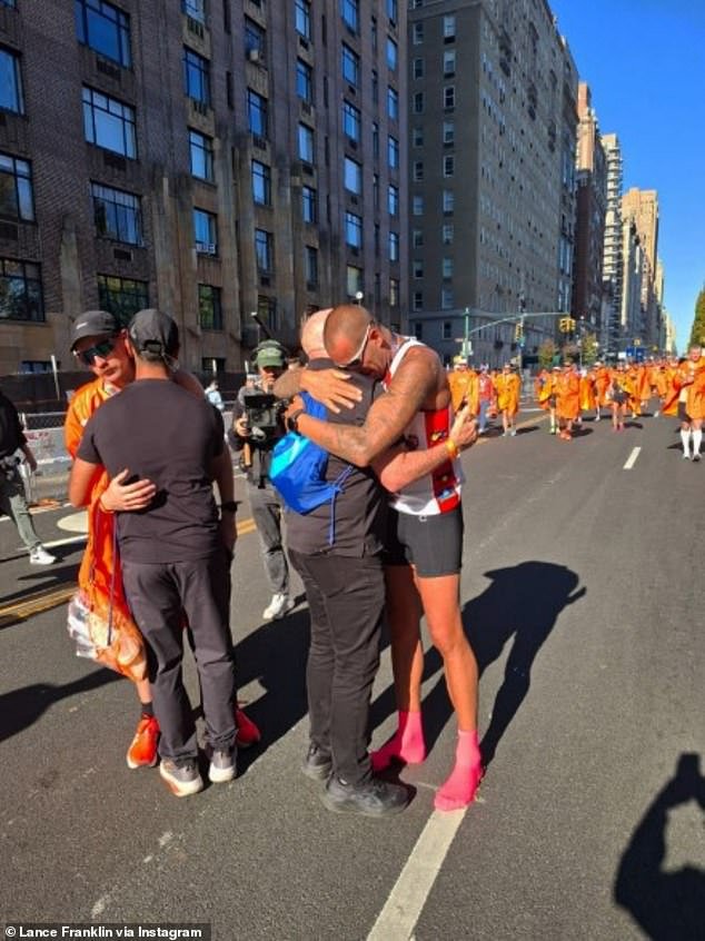 103614045-15261081-Lance_Franklin_right_completed_the_New_York_Marathon_this_weeken-a-105_1762350081230.jpg