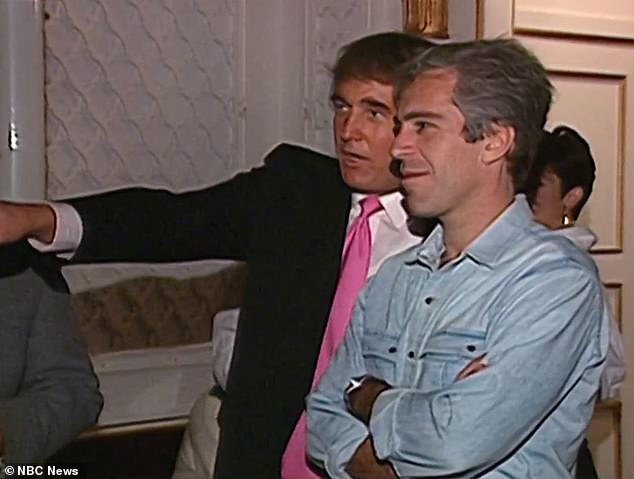 103987139-15303481-Donald_Trump_and_Jeffrey_Epstein_chat_at_a_social_event_in_a_sti-a-32_1763503519288.jpg