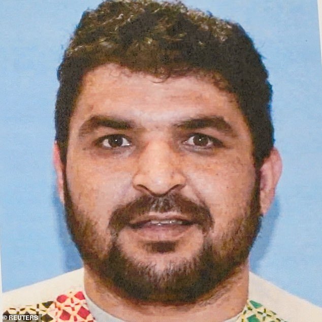 104241097-15335059-Afghan_soldier_Rahmanullah_Lakanwal_29_was_named_as_the_alleged_-a-18_1764338323727.jpg