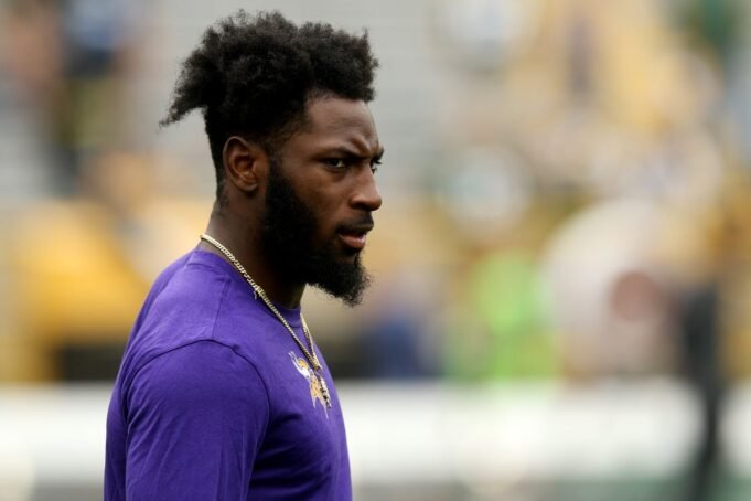 Defensive-back-Kris-Boyd-38-of-the-Minnesota-Vikings-warms-up-against-the-Green-Bay-Packers-before-t.jpeg