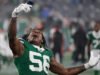 Quincy Williams chega maquiado de palhaço para o jogo dos Jets em Gotham City contra os Dolphins
