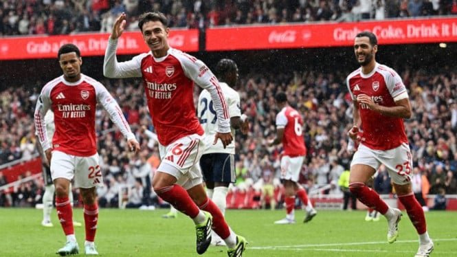 68c61abfbb356-pemain-arsenal-rayakan-gol-martin-zubimendi_665_374.jpg