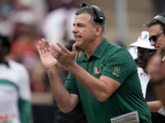 Ohio State e Miami se preparam para um confronto épico CFP com o foco agora, não naquela bandeira há muito tempo