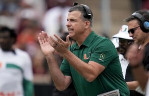 Ohio State e Miami se preparam para um confronto épico CFP com o foco agora, não naquela bandeira há muito tempo