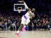 LeBron James lidera o 76ers com 10 pontos consecutivos no 4T, incluindo punhal de última hora, para levar o Lakers à vitória