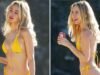 Kimberly Garner parece impecável em um maiô minúsculo em uma praia do Caribe