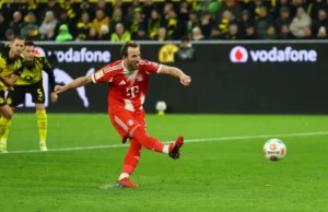O bis de Kane e o golo de Kimmich levaram o Bayern a uma vitória de recuperação por 3-2 sobre o Dortmund.