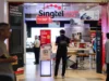 O lucro da Singtel no terceiro trimestre aumenta 43,5%, para US$ 1,9 bilhão, devido ao ganho único com a venda de ações da Airtel